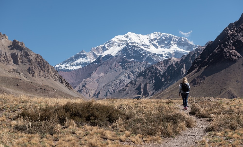Single hiker following trail to Aconcagua Mountain