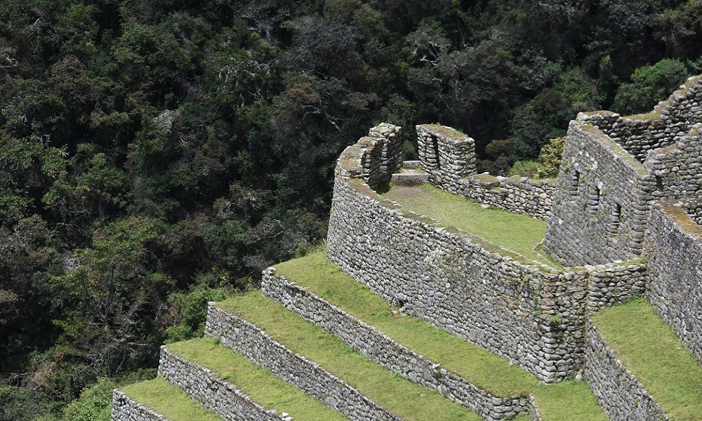 Photo of Inca Ruin with cloud-forest in the background