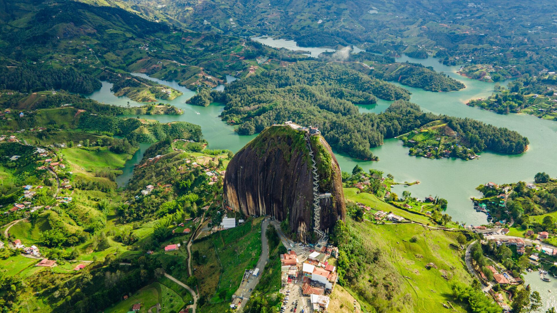 Aerial,View,Of,The,Peñol,Stone,Next,To,The,Lake
